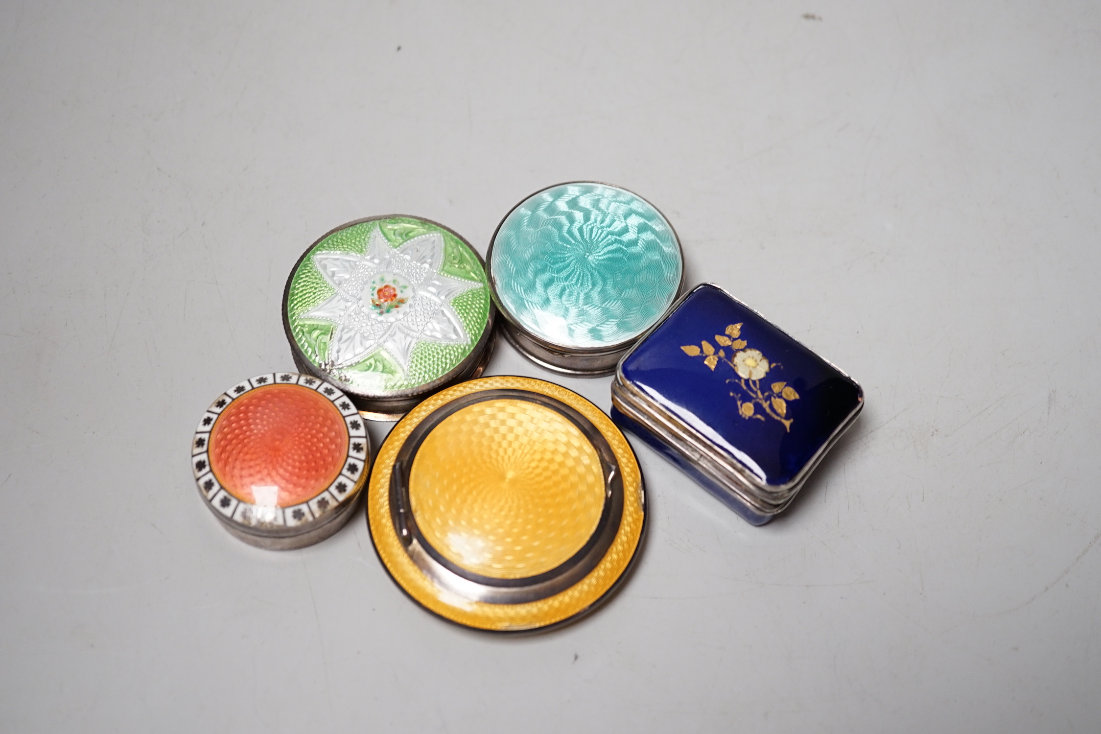 Three assorted silver and enamel boxes including a compact, one sterling and enamel box and one other enamelled box, largest 60mm.